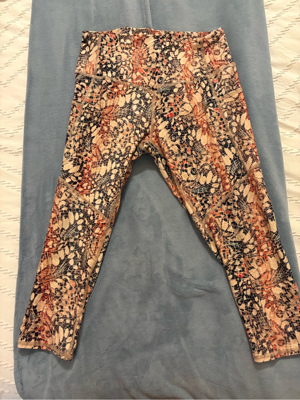 Evolution and Creation Womens Capri Leggings in Neutral Cream, Black, Orange